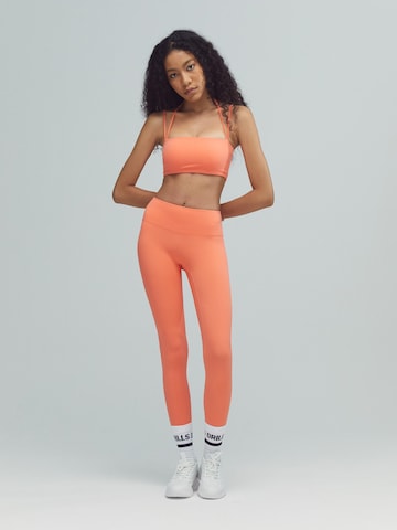 DRILLS Apparel Bandeau Sports bra 'ACTIVE Bandeau Bra' in Orange: front