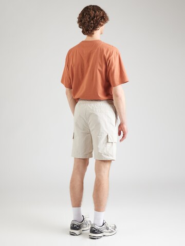 Karl Kani regular Cargobukser 'Essential' i beige