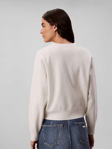 Pull-over Calvin Klein Jeans en blanc