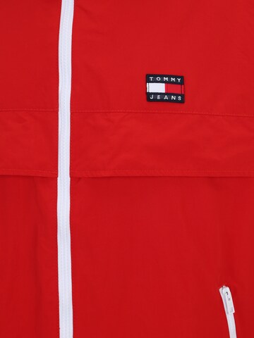 Tommy Jeans Plus Between-Season Jacket 'Chicago' in Red
