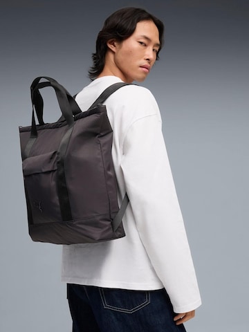 PUMA - Mochila 'Puma Essentials Tote Backpack 12L' en negro: frente