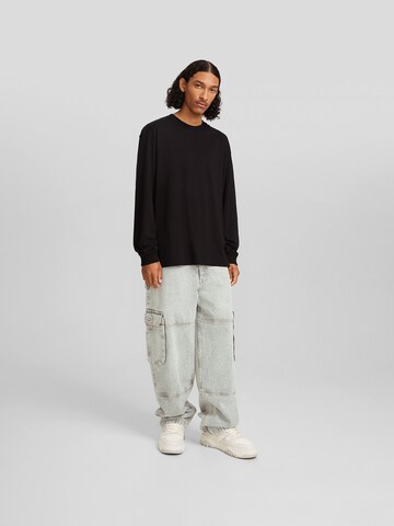 Bershka Loosefit Jeans i grå