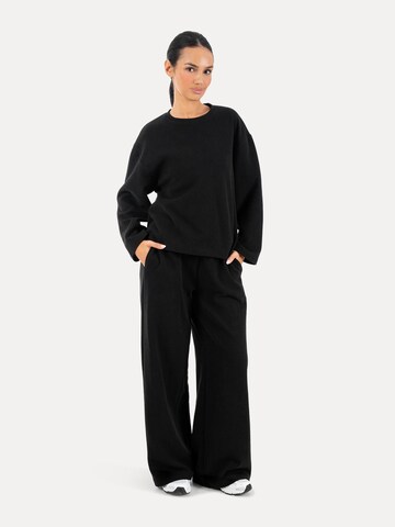 Smilodox Loosefit Broek in Zwart: voorkant