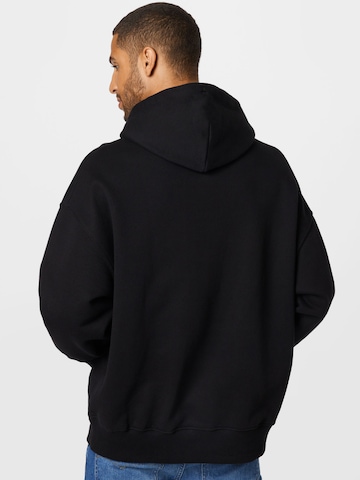 Tommy Jeans - Sudadera en negro