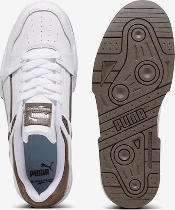 Baskets basses 'Slipstream' PUMA en blanc