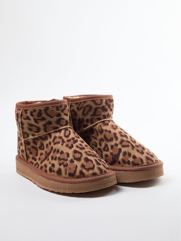 Botine de la Trendyol pe maro