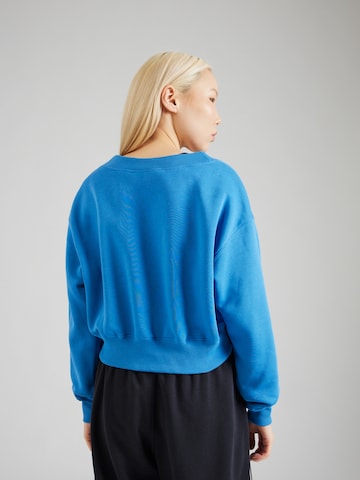 Nike Sportswear Sweatshirt 'Phoenix Fleece' in Blauw