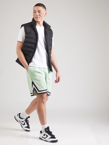 Loosefit Pantalon Karl Kani en vert