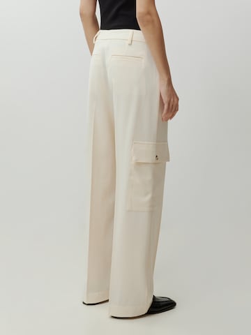 EDITED Loose fit Pleat-front trousers 'Mako' in Beige