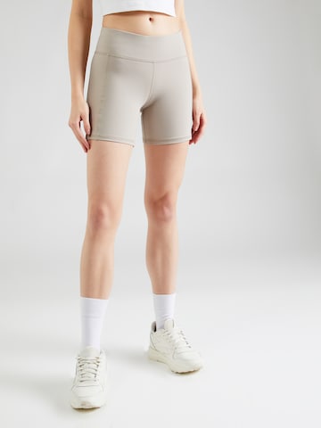 Reebok Skinny Sportbroek in Beige: voorkant