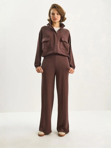 Abito da casa di Bianco Lucci in marrone: frontale