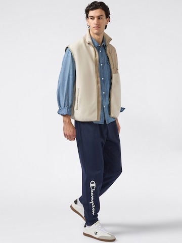 Champion Authentic Athletic Apparel Zwężany krój Spodnie w kolorze niebieski