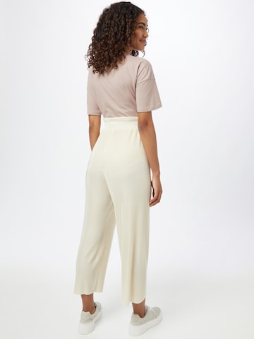 ABOUT YOU Limited Loose fit Pants 'Libby' in Beige