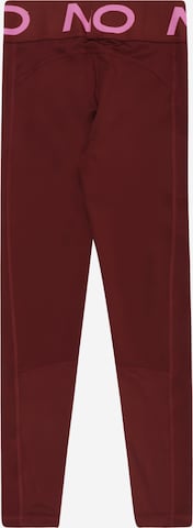 Skinny Pantaloni sportivi 'NP' di NIKE in rosso