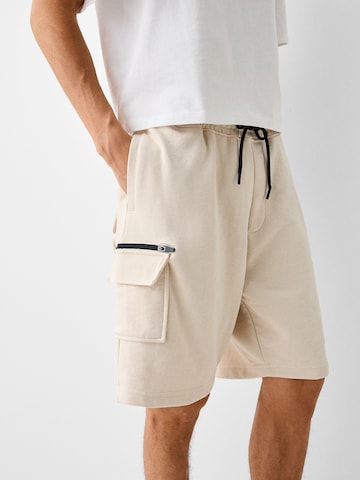 Bershka Loose fit Cargo Pants in Beige