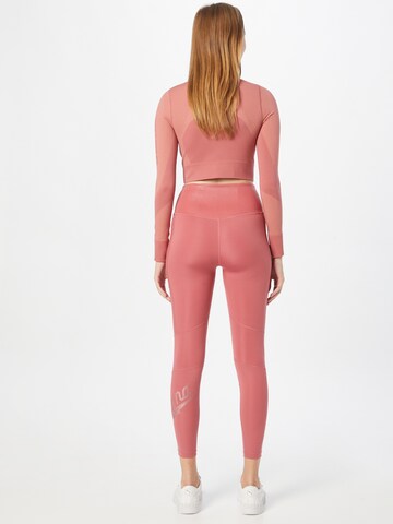 PUMA Skinny Sportbroek in Roze