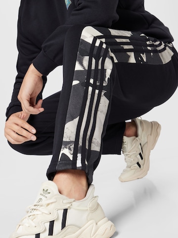 ADIDAS ORIGINALS Regular Trousers 'Camo Series Sweat' in Black