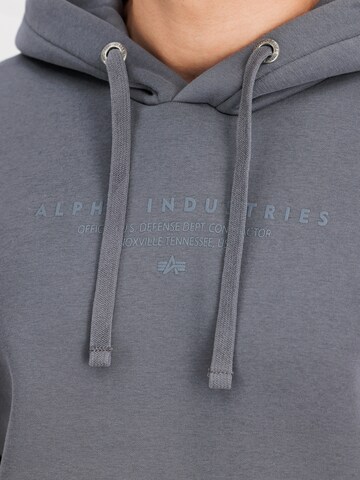 ALPHA INDUSTRIES Bluzka sportowa 'DTM' w kolorze szary