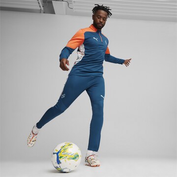 PUMA Tapered Sportbroek 'Neymar JR Creativity' in Blauw