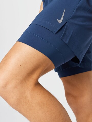 NIKE Regular Sports trousers 'Flex Active' in Blue