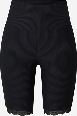 Urban Classics Skinny Leggings in Black: front