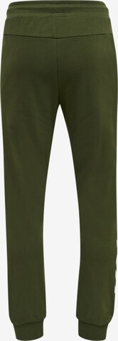 Effilé Pantalon de sport Hummel en vert