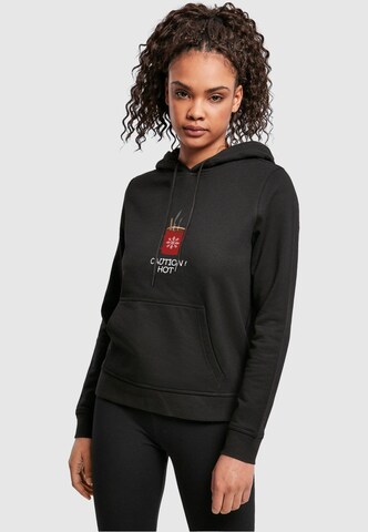 Merchcode Sweatshirt 'Caution Hot' in Zwart: voorkant