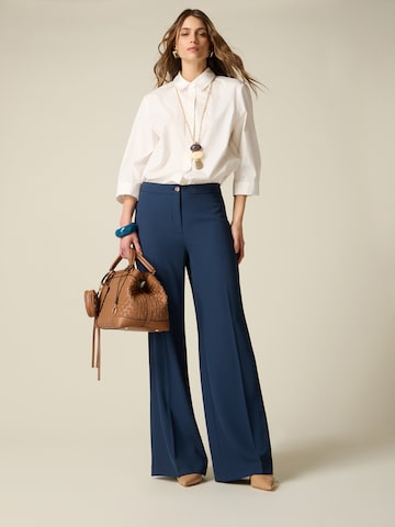 oltre - Acampanado Pantalón en azul