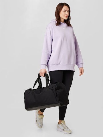 Reebok Sports sweatshirt in Purple