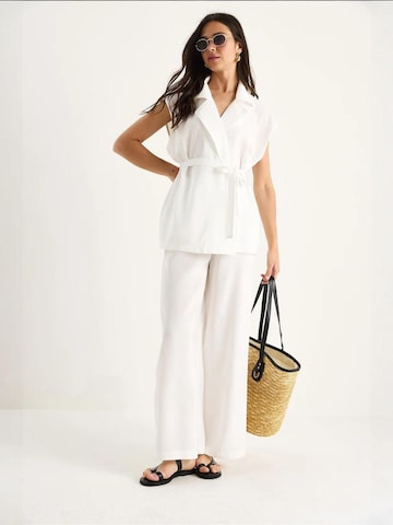 Pantalons de tailleur Bianco Lucci en blanc
