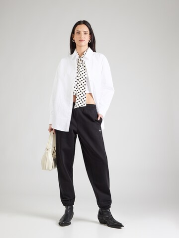 Effilé Pantalon Calvin Klein Jeans en noir