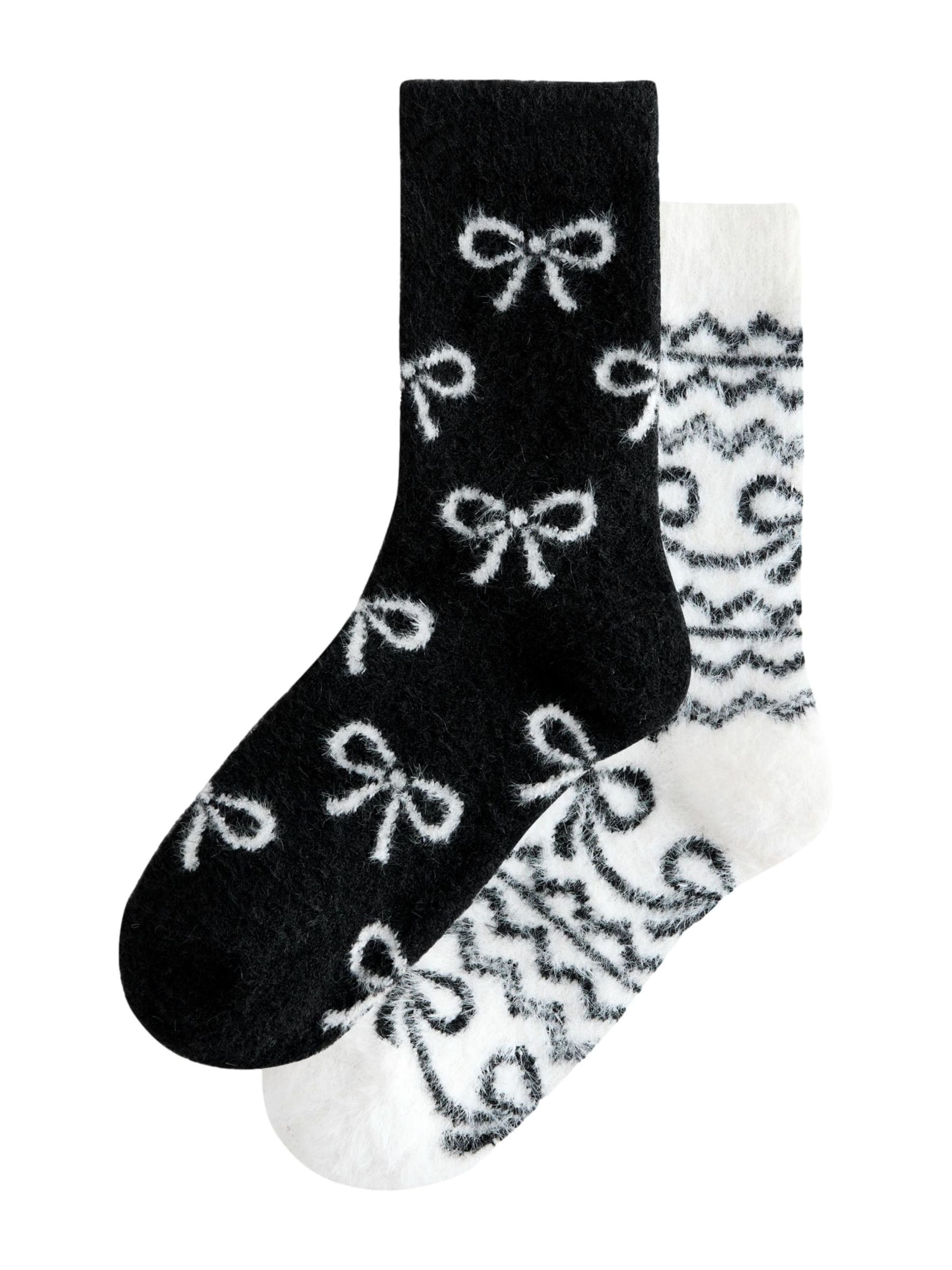 Next Nogavice | črna barva: sprednja stran