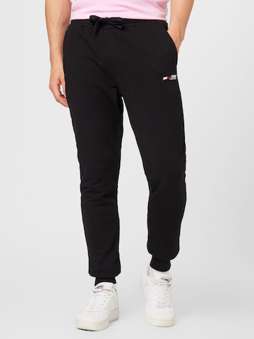 TOMMY HILFIGER Tapered Trousers in Black: front