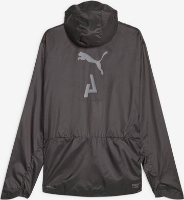 PUMA Sportjacke in Schwarz