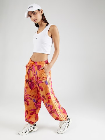 ADIDAS SPORTSWEAR Tapered Παντελόνι φόρμας 'FARM PRM' σε πορτοκαλί
