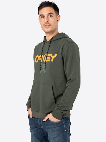 OAKLEY Regular Fit Sportsweatshirt 'SKULL' in Grau: predná strana