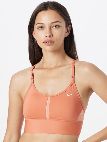 Bustier Soutien-gorge de sport 'INDY' NIKE en orange : devant