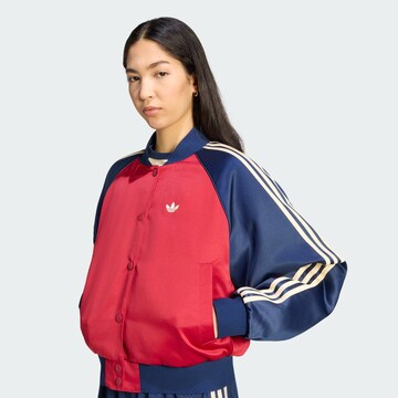 ADIDAS ORIGINALS - Chaqueta de entretiempo 'SST' en rojo