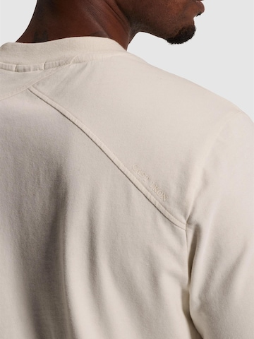 CAST IRON Koszulka 'T-shirt with mixed-technique chest graphic' w kolorze beżowy
