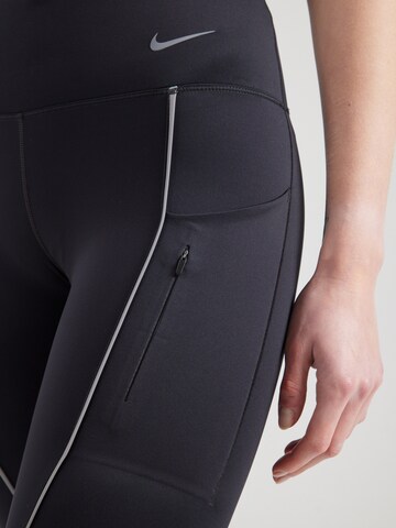 NIKE - Skinny Pantalón deportivo 'Go' en negro