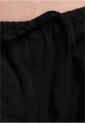 Loosefit Pantaloni di Karl Kani in nero