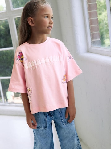 Tricou 'Tamagotchi' de la Next pe roz
