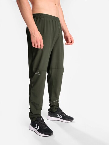 Newline Regular Sports trousers 'PACE' in Green: front