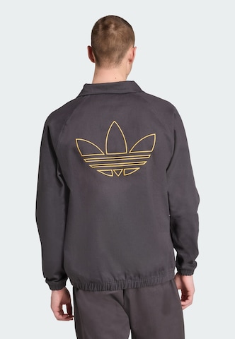 Sweat-shirt 'Manchester United Terrace Icons' ADIDAS ORIGINALS en noir : devant