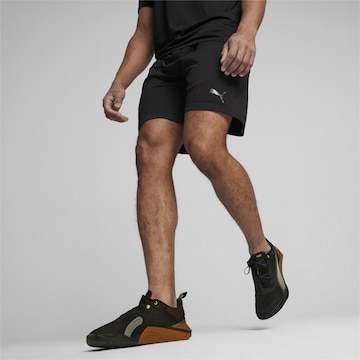 PUMA - Regular Calças de desporto em preto: frente