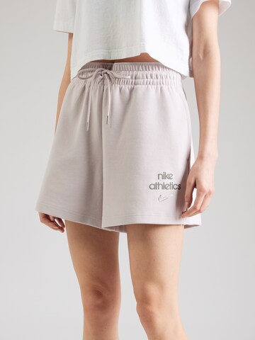 Loosefit Pantaloni di Nike Sportswear in lilla