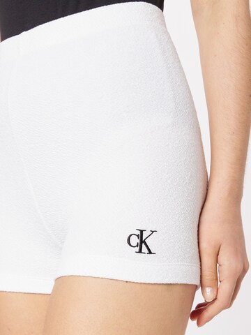 Calvin Klein Jeans Skinny Legíny – bílá