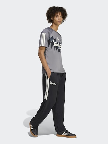 ADIDAS SPORTSWEAR Loosefit Sportbroek 'TIRO' in Zwart: voorkant