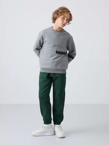 Tommy Life Broek 'TOMMY Kinder Jogginghose' in Groen