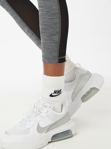 NIKE Skinny Workout Pants in Grey